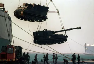 Gulf War Operation Desert Storm. Tanks and mobile guns are unloaded from transport ships Gulf War Operation Desert Storm. Tanks and mobile guns are unloaded from transport ships