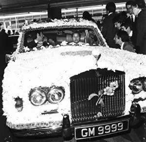 Guru Maharishi 15 in flower covered Rolls Royce in 1973 The Divine Light on a visit Guru Maharishi 15 in flower covered Rolls Royce in 1973 The Divine Light on a visit