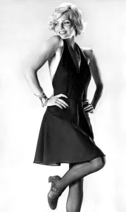 The halter neckline plunges deep at the front, and the top is outlined with diamante The halter neckline plunges deep at the front, and the top is outlined with diamante