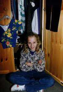 Hannah Walton on of the Walton Sextuplets sits cross legged in front of her open wardobe Hannah Walton on of the Walton Sextuplets sits cross legged in front of her open wardobe