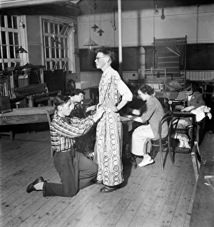 Harry Ogle (16) - Dress Designer seen here fitting his design on another student Harry Ogle (16) - Dress Designer seen here fitting his design on another student