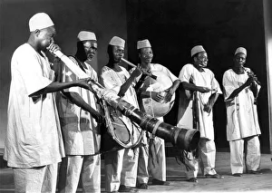 The Hausa Instrumentalists with a member of the goup playing the Shantu The Hausa Instrumentalists with a member of the goup playing the Shantu