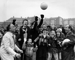 A head start for the new all-weather pitch as Sports Minister Neil MacFarlane (left A head start for the new all-weather pitch as Sports Minister Neil MacFarlane (left