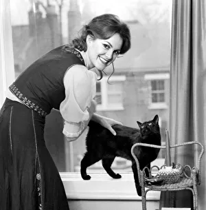 Healers Feature: Anna MaCloud: Woman with cat. February 1975 75-00711-004 Healers Feature: Anna MaCloud: Woman with cat. February 1975 75-00711-004