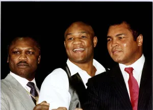 Former heavyweight boxing champion Joe Frazier (left) pictured with George Foreman Former heavyweight boxing champion Joe Frazier (left) pictured with George Foreman