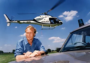 A helicoper hovers above the head of actor Nigel Le Vaillant in a field at Studley Grange A helicoper hovers above the head of actor Nigel Le Vaillant in a field at Studley Grange