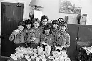 Highburton Guides are pictured with home made sweets at a coffee morning which raised Highburton Guides are pictured with home made sweets at a coffee morning which raised