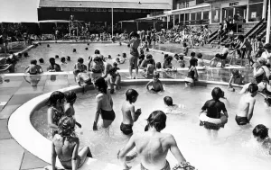 Holiday makers enjoy the Swimming and Paddling Pools at Trecco Bay, Porthcawl, Bridgend Holiday makers enjoy the Swimming and Paddling Pools at Trecco Bay, Porthcawl, Bridgend