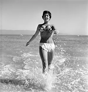 Holidays: Woman enjoying the beach on Corsica. August 1957 A503a-017 Holidays: Woman enjoying the beach on Corsica. August 1957 A503a-017