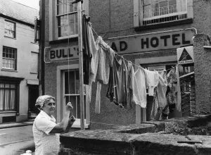 Hotel Landlady Mrs Maureen Roach puts up another line of washing outside the Bull' Hotel Landlady Mrs Maureen Roach puts up another line of washing outside the Bull'