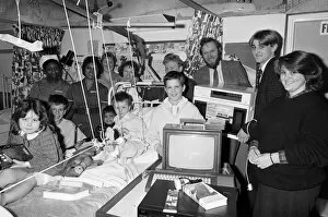 Images Dated 25th January 1989: Huddersfield Polytechnic catering students present items to the Children