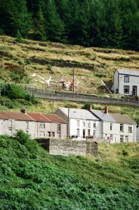 A huge Dragon made from recycled marble on the hillside in Blaenllechau A huge Dragon made from recycled marble on the hillside in Blaenllechau