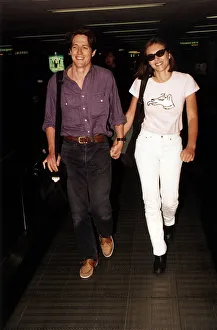 Hugh Grant Actor walking hand in hand with girlfriend Elizabeth Hurley Hugh Grant Actor walking hand in hand with girlfriend Elizabeth Hurley