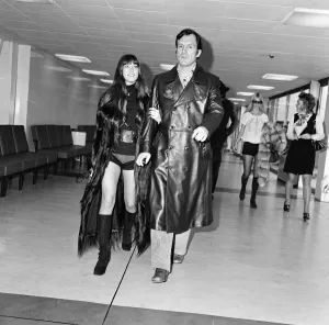 Hugh Hefner and his girlfriend Barbi Benton at London's Heathrow airport Hugh Hefner and his girlfriend Barbi Benton at London's Heathrow airport