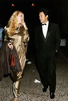 Imran Khan Cricket with jerry hall on a night out. May 1995 Imran Khan Cricket with jerry hall on a night out. May 1995