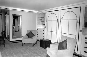 Interior view showing one of the cabin living rooms aboard the luxury passenger liner QE2 Interior view showing one of the cabin living rooms aboard the luxury passenger liner QE2