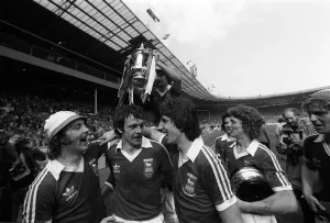 Ipswich team celebrate with the trophy after beating Arsenal in FA cup final may 1978 Ipswich team celebrate with the trophy after beating Arsenal in FA cup final may 1978