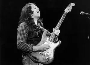 Irish blues rock musician and singer Rory Gallagher piuctured performing in concert Irish blues rock musician and singer Rory Gallagher piuctured performing in concert