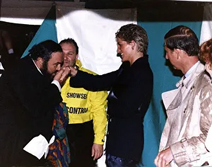 Italian opera singer Luciano Pavarotti kisses the hand of Princess Diana as Prince Italian opera singer Luciano Pavarotti kisses the hand of Princess Diana as Prince