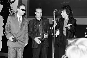 Images Dated 7th April 1986: The Ivor Novello Awards at Gorsvenor House, London. Pictured, on stage Elton John