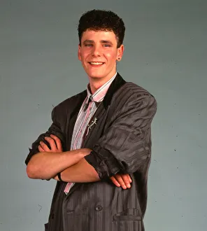 Jacket Fashion - male model wears striped jacket with sleeves rolled up November 1986 Jacket Fashion - male model wears striped jacket with sleeves rolled up November 1986
