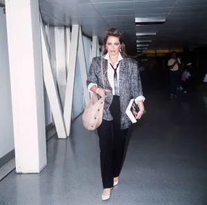Jackie Collins arriving at Heathrow with her new book September 1985 Jackie Collins arriving at Heathrow with her new book September 1985