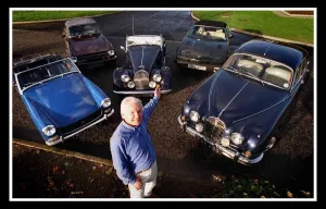 Jaguar Cars November 1999 man standing with cars Jaguar Cars November 1999 man standing with cars