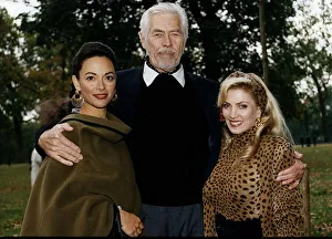 James Coburn American actor stands with his arms around Paula Murad on his left James Coburn American actor stands with his arms around Paula Murad on his left