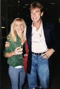 James Hunt racing driver with arm around Helen Dyson James Hunt racing driver with arm around Helen Dyson