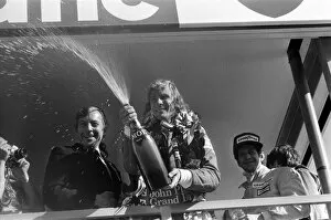 Images Dated 19th July 1976: James Hunt storms to a controversial win at the British Grand Prix