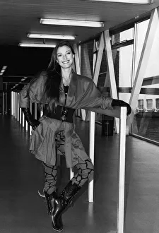 Jane Seymouractress arriving at Heathrow airport leaning on rail Jane Seymouractress arriving at Heathrow airport leaning on rail