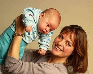 Janet Ellis TV television presenter November 1987 holding baby son Jack in the air Janet Ellis TV television presenter November 1987 holding baby son Jack in the air