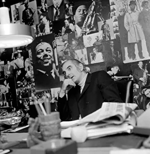Jazz performer and legendary club owner Ronnie Scott in his office in London Jazz performer and legendary club owner Ronnie Scott in his office in London