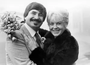 Jazz Trumpeter Kenny Ball with his new wife Michelle Wilde on their wedding day Jazz Trumpeter Kenny Ball with his new wife Michelle Wilde on their wedding day