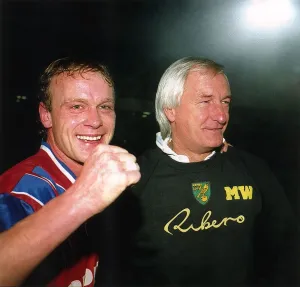 Jeremy Goss Norwich City footballer celebrates with manager Mike Walker after beating Jeremy Goss Norwich City footballer celebrates with manager Mike Walker after beating