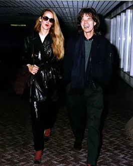 Jerry Hall and Mick Jagger at Heathrow Airport. February 1993 Jerry Hall and Mick Jagger at Heathrow Airport. February 1993
