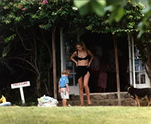 Jerry Hall Model in garden with her son James Jerry Hall Model in garden with her son James