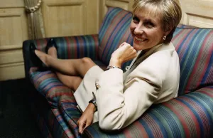 Jill Dando TV Presenter sitting with legs up on sofa Jill Dando TV Presenter sitting with legs up on sofa