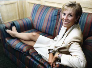 Jill Dando TV Presenter sitting with legs up on sofa Jill Dando TV Presenter sitting with legs up on sofa