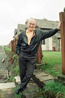 Jim Bowen by the railway which passes by his house in Arkholme, Lancashire Jim Bowen by the railway which passes by his house in Arkholme, Lancashire