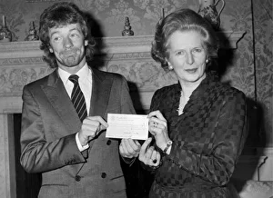 Jim Davidson presenting cheque to Margaret Thatcher during reception at Number 10 Downing Jim Davidson presenting cheque to Margaret Thatcher during reception at Number 10 Downing