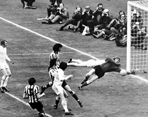 Jim Montgomery saves from Peter Lorimer 1973 during FA cup final between Sunderland Jim Montgomery saves from Peter Lorimer 1973 during FA cup final between Sunderland