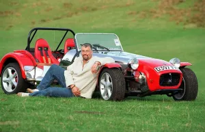 JIM THOMPSON WITH HIS LOTUS 7 KIT CAR SEPTEMBER 1997 SITTING AGAINST CAR JIM THOMPSON WITH HIS LOTUS 7 KIT CAR SEPTEMBER 1997 SITTING AGAINST CAR