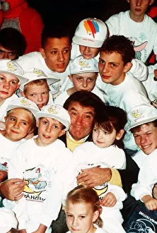 Jimmy Tarbuck TV Presenter Comedian at Heathrow with handicapped children who are on a Jimmy Tarbuck TV Presenter Comedian at Heathrow with handicapped children who are on a
