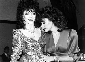 Joan Collins Actress holding waxwork model of herself March 1989 Joan Collins Actress holding waxwork model of herself March 1989