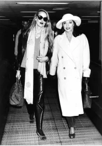 Joan Collins Actress With Supermodel Jerry Hall Wife Of Rock Star Mick Jagger Leaving Joan Collins Actress With Supermodel Jerry Hall Wife Of Rock Star Mick Jagger Leaving
