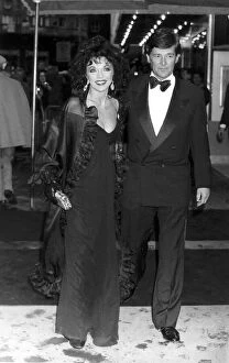 Images Dated 28th April 1989: Joan Collins Actress walking arm in arm with her new man Malcolm Frazer