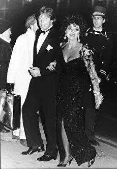 Joan Collins and boyfriend Bill Wiggins arrive at the Cafe Royale November Joan Collins and boyfriend Bill Wiggins arrive at the Cafe Royale November