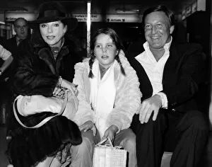 Joan Collins with her husband and her daughter at Heathrow on their way back to San Joan Collins with her husband and her daughter at Heathrow on their way back to San