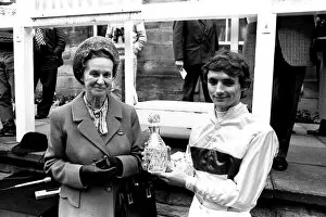 Images Dated 25th August 1986: Jockey Walter Swinburn receives a winners trophy at Gosforth Park Racecourse, Newcastle